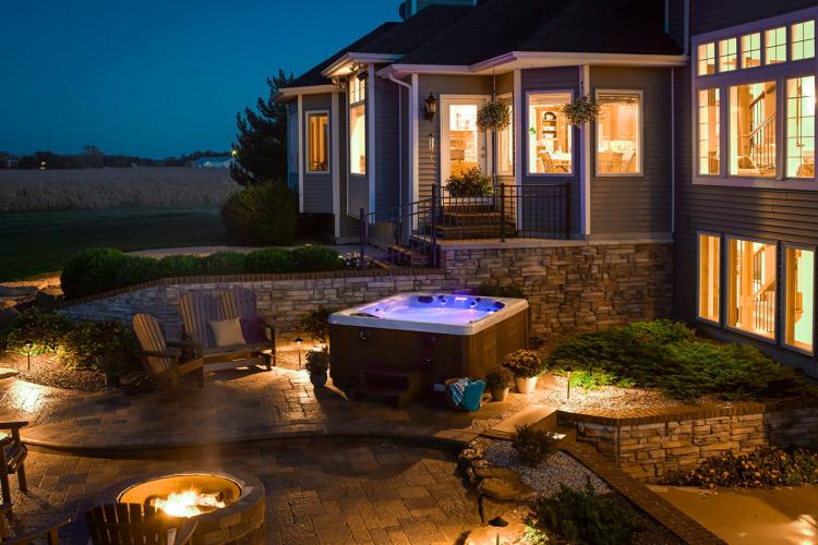 Hot tub fire pit patio at night